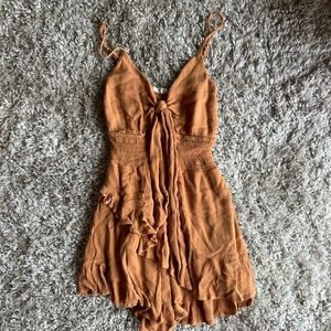 Tan romper! Size S.